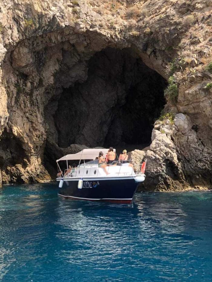 Your day in Giardini Naxos: Rent a motorboat for a full day of discovery