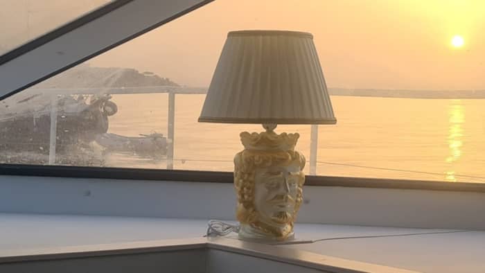 Discover Giardini Naxos on a motorboat for 8h