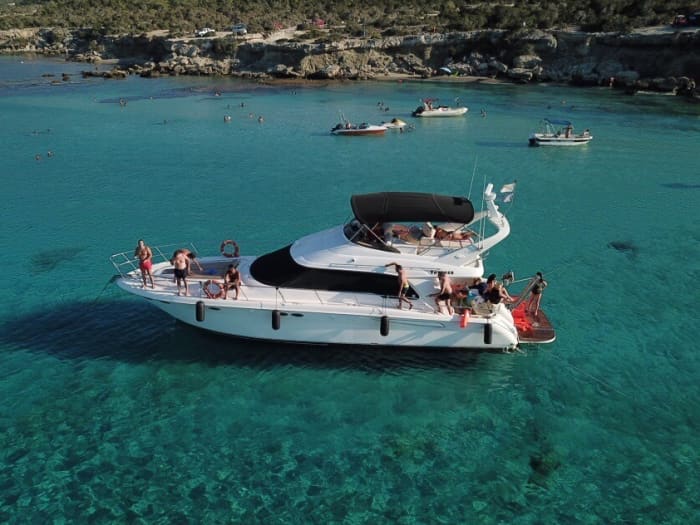 Discover Latsi on a half-day motor yacht trip