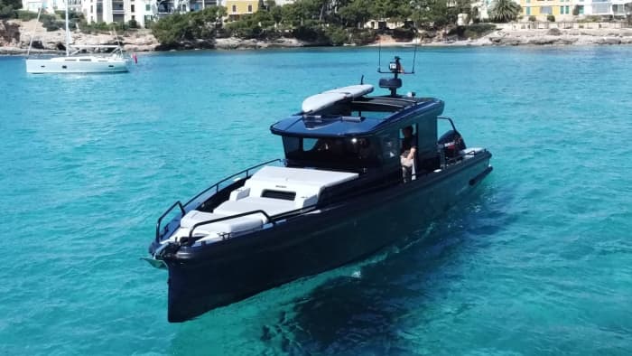 Discover Ibiza on a full-day trip on a motorboat