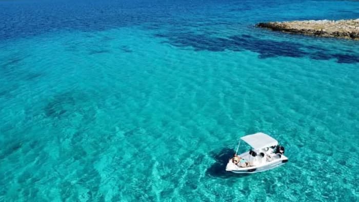 Your private motorboat for a day around Paros