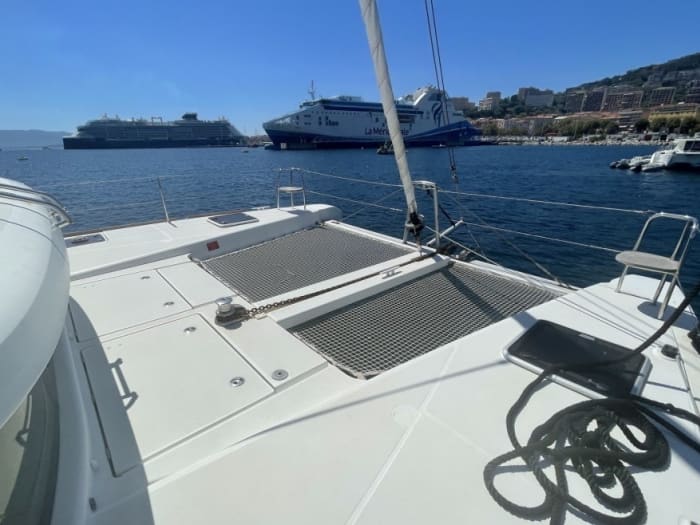 Spend 8 hours sailing around Ibiza by catamaran