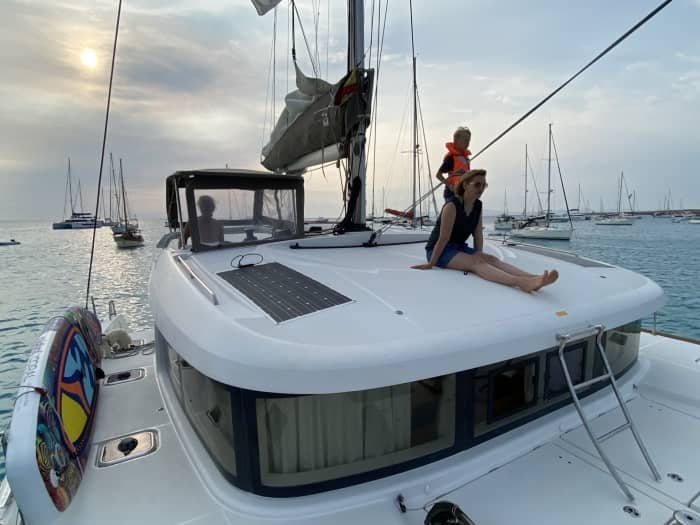 Spend 8 hours sailing around Ibiza by catamaran