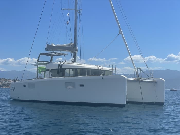Spend 8 hours sailing around Ibiza by catamaran