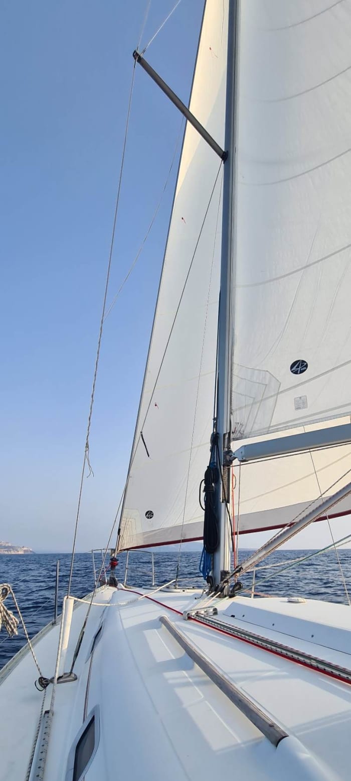 Set your course for joy: A full day of authentic sailing in Santorini on a sailboat