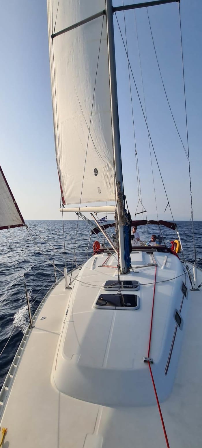 Set your course for joy: A full day of authentic sailing in Santorini on a sailboat