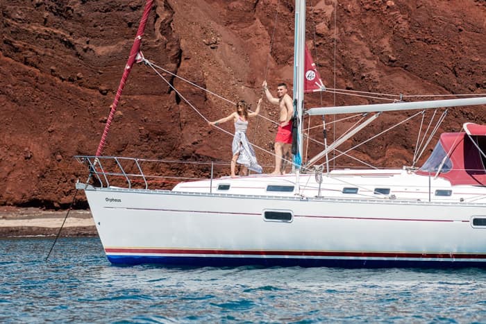 Set your course for joy: A full day of authentic sailing in Santorini on a sailboat