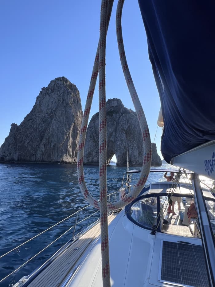 Explore Ostia and enjoy a full day of sailing on a sailboat