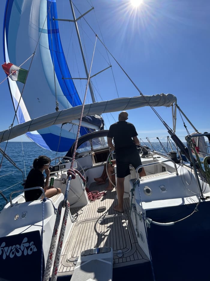 Explore Ostia and enjoy a full day of sailing on a sailboat
