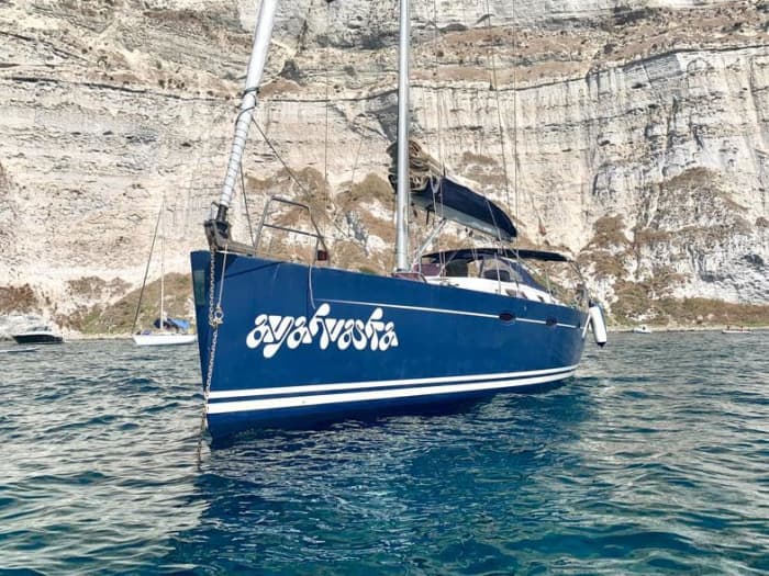 Explore Ostia and enjoy a full day of sailing on a sailboat