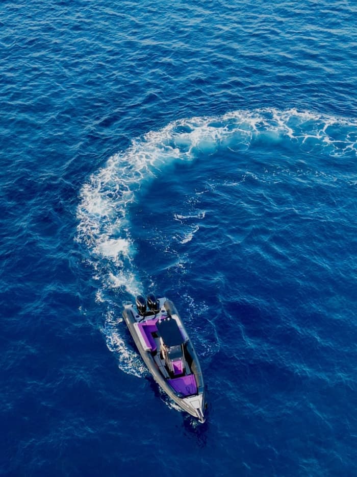Enjoy a half-day Odyssey around Santorini on a motorboat