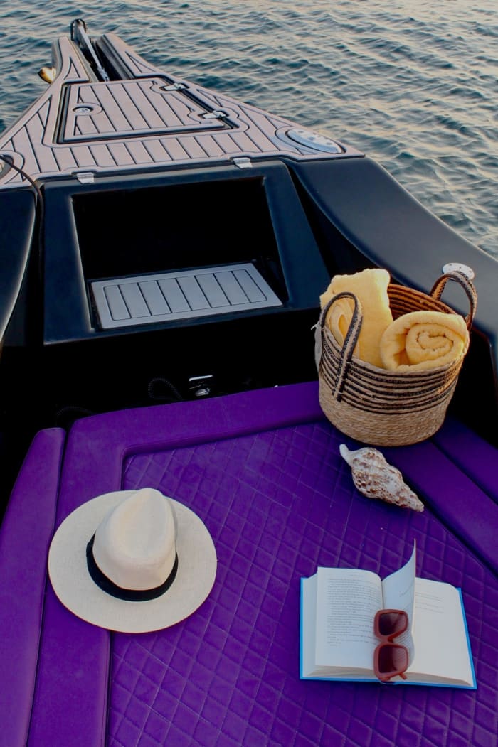 Enjoy a half-day Odyssey around Santorini on a motorboat