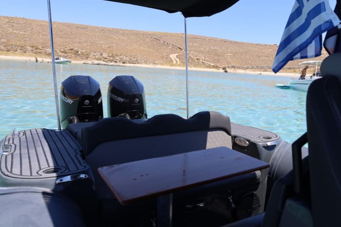 Discover Mykonos's shores: A complete day trip aboard a motorboat