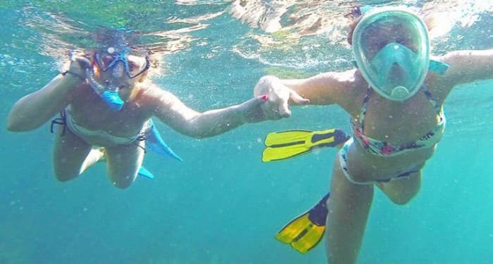 Escapada de día completo en catamarán: rema y haz snorkel en el corazón de las Islas Turcas y Caicos