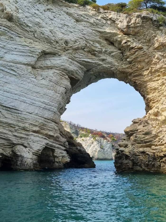 Discover Vieste's shores: A complete day trip aboard a motorboat