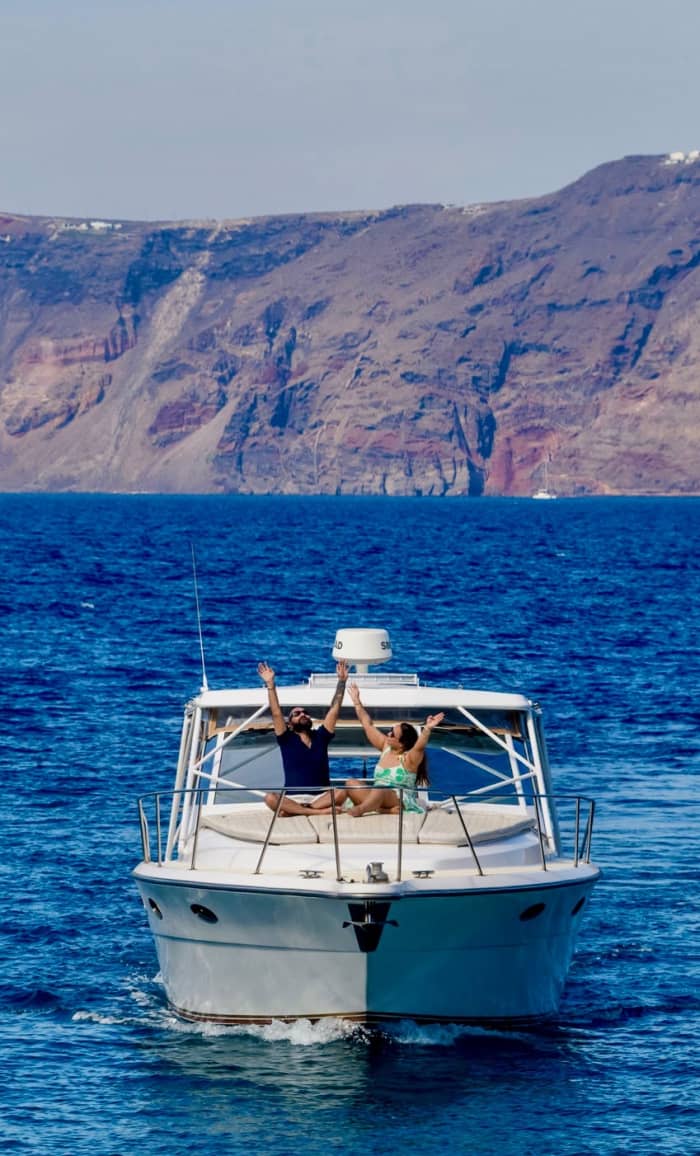 Enjoy a full day on a motorboat in Santorini