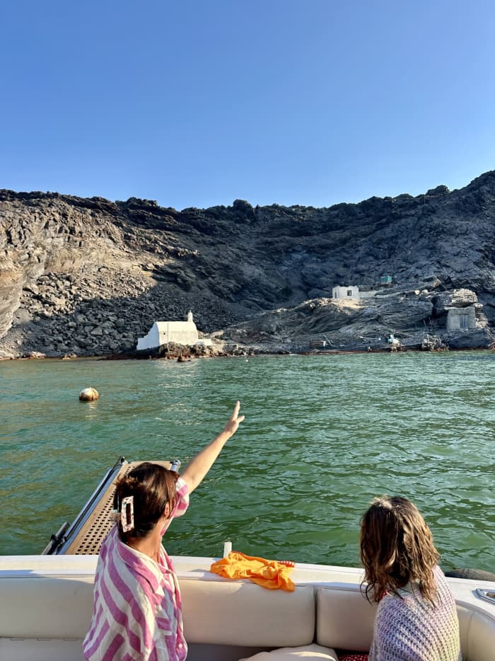 Enjoy a full day on a motorboat in Santorini