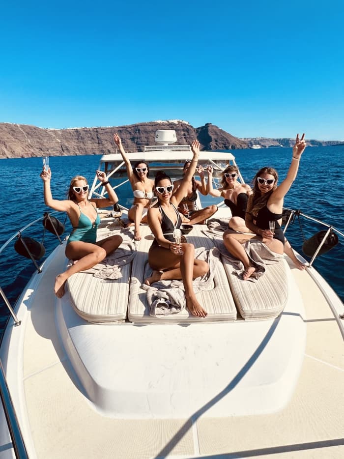 Enjoy a full day on a motorboat in Santorini