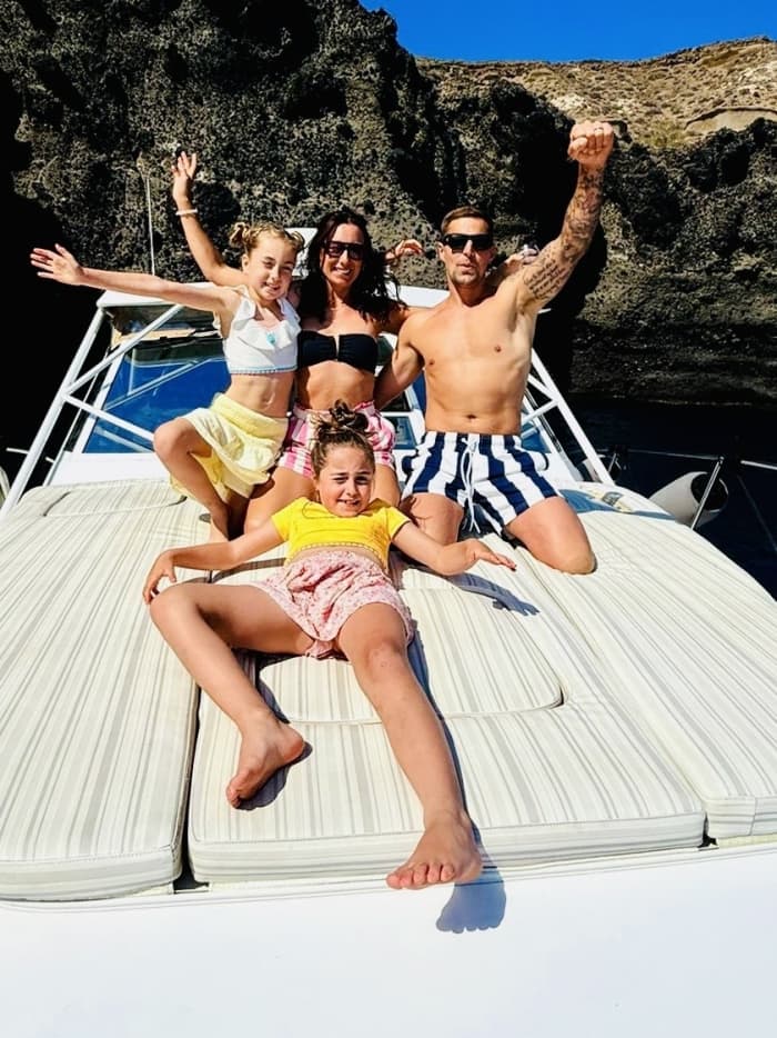 Enjoy a full day on a motorboat in Santorini