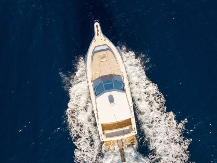 Enjoy a full day on a motorboat in Santorini