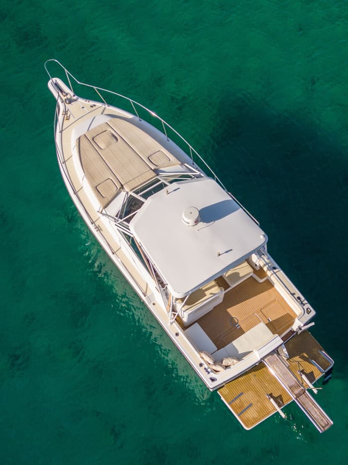 Enjoy a full day on a motorboat in Santorini