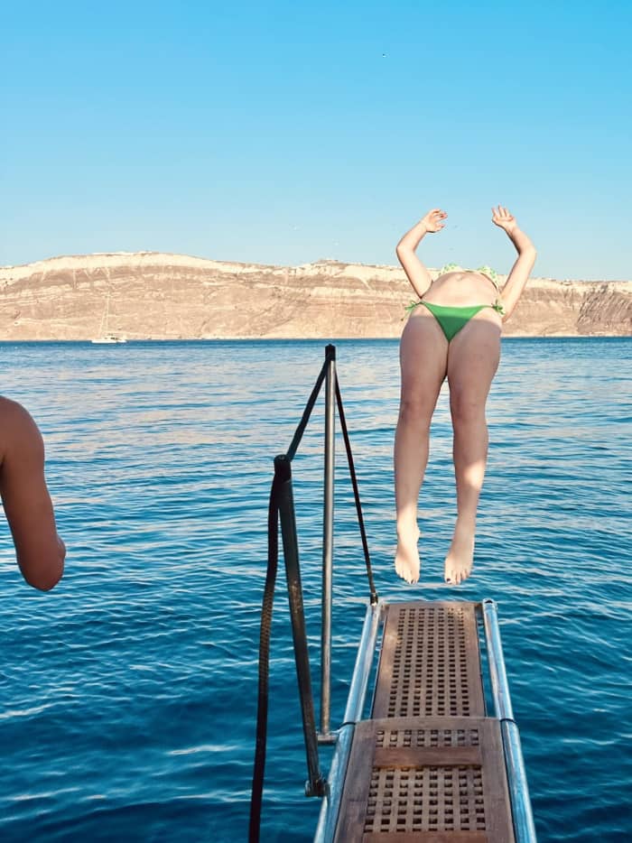 Enjoy a full day on a motorboat in Santorini
