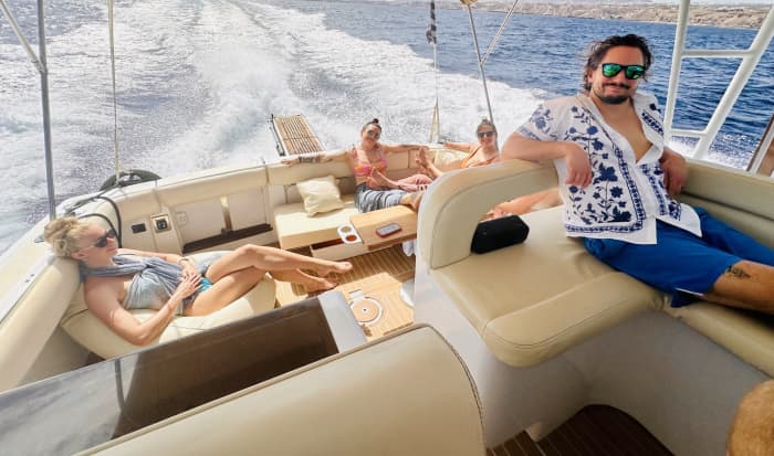 Enjoy a full day on a motorboat in Santorini