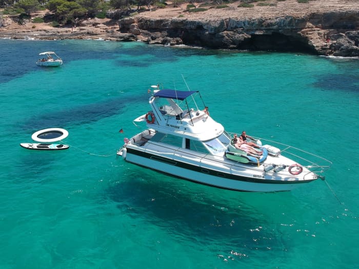 Drinks included!!! 7-hour private boat trip along Mallorca's most beautiful coastline with a motorboat