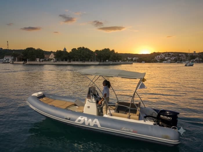 Sail towards the Tavolara sunset with an aperitif on board from Olbia