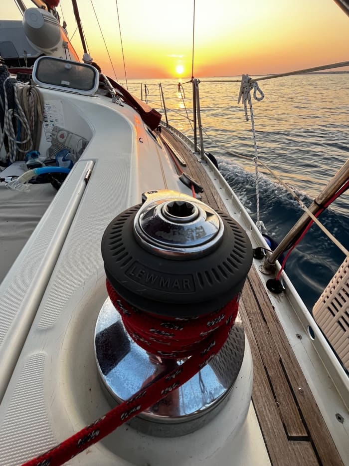 Sunset aperitif on a sailboat off the coast of Ostia