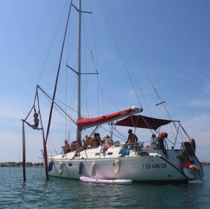 Sunset aperitif on a sailboat off the coast of Ostia