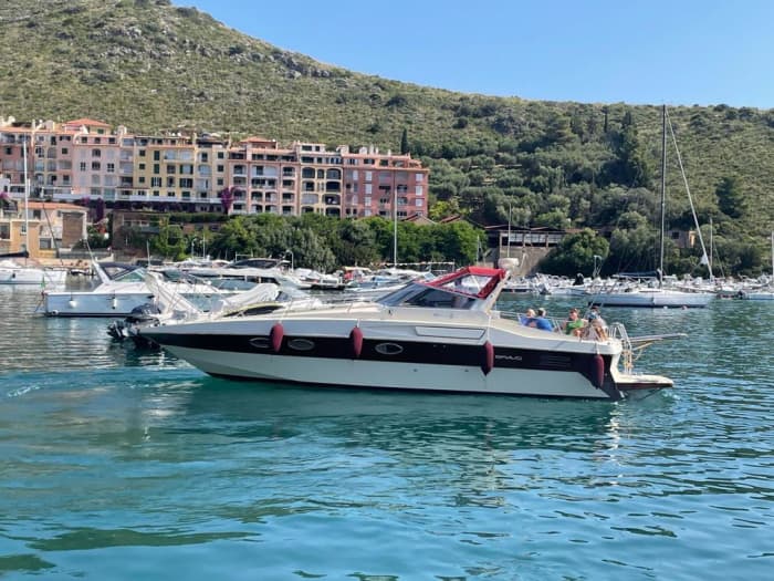 Descubra Porto Santo Stefano: Um dia inteiro de sol em uma lancha.