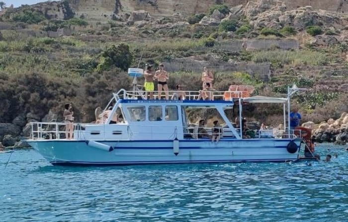Heading to Comino & Gozo: 6-hour private cruise between wild coves and crystal-clear waters