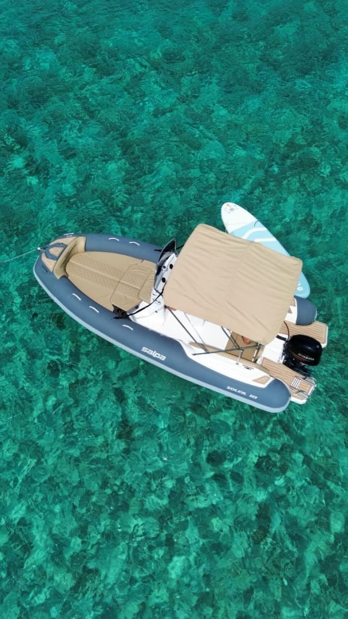 Private boat trip around Baja Sardinia on a motorboat