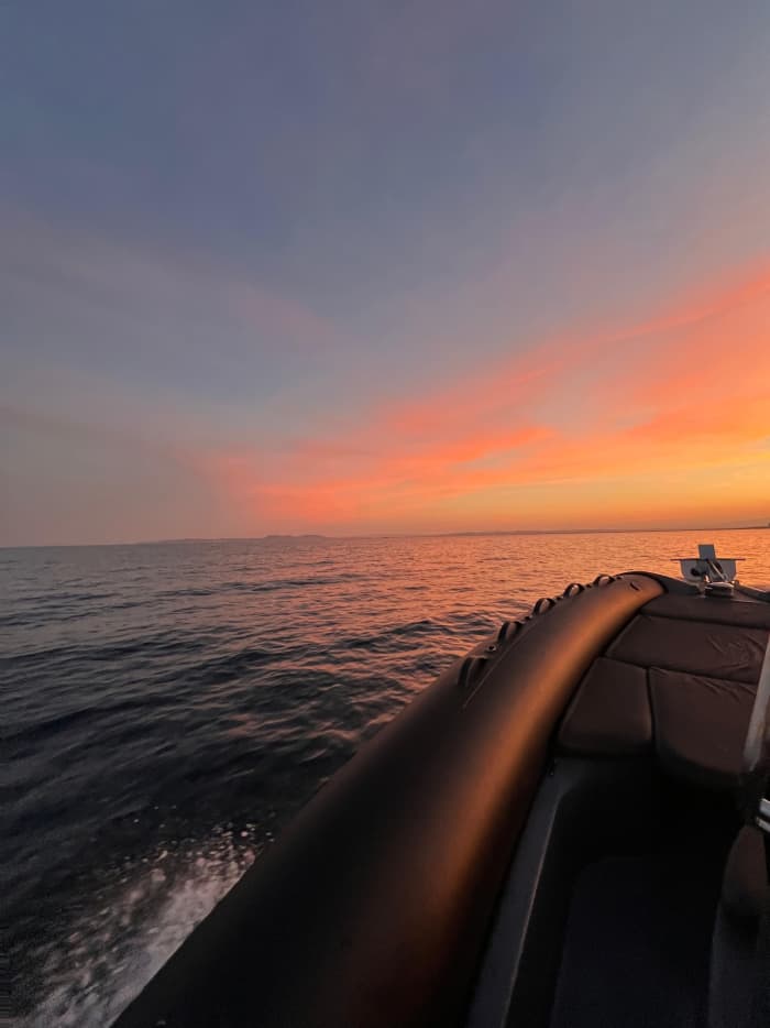Experience the sunset from the sea