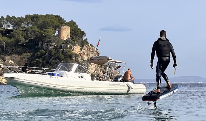Private sunset boat party with water toys