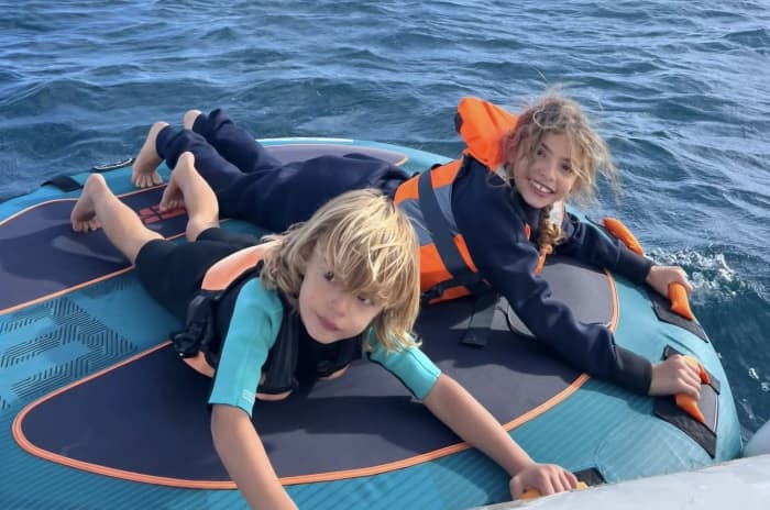 Private sunset boat party with water toys