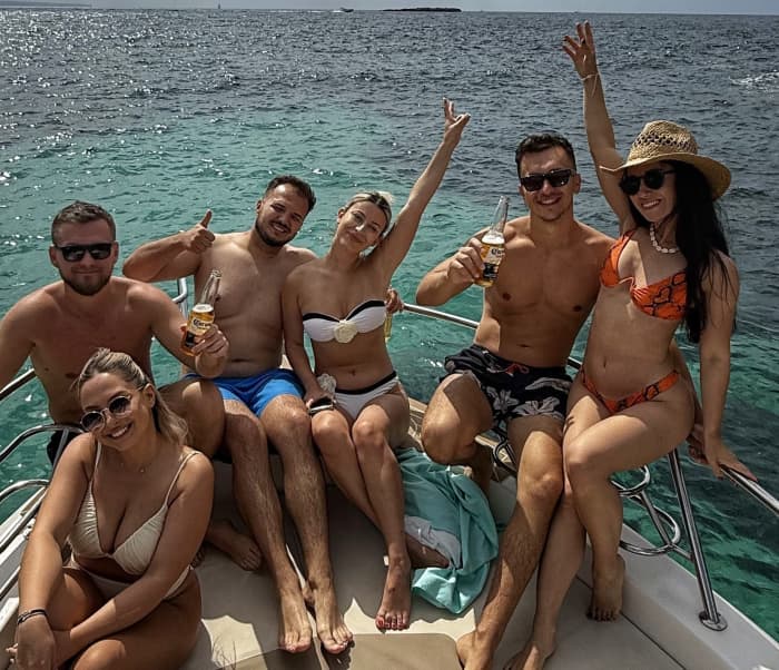 Private sunset boat party with water toys