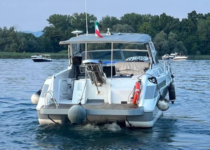Relax on a motorboat in Angera for 4 hours or a whole day
