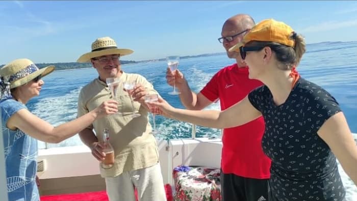 Discover Fažana's shores: A complete day trip aboard a motorboat
