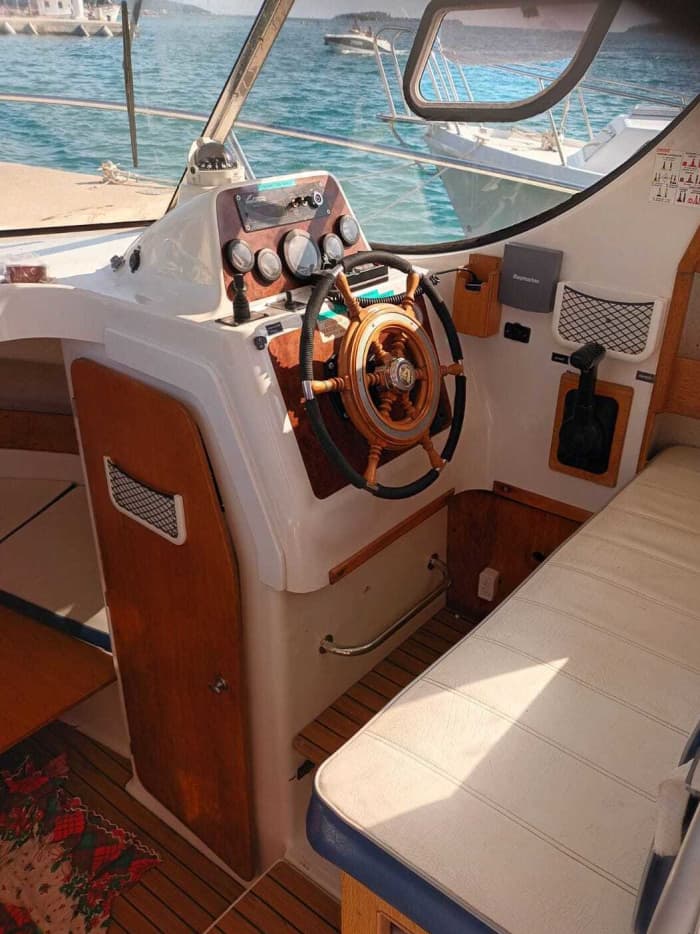 Discover Fažana's shores: A complete day trip aboard a motorboat