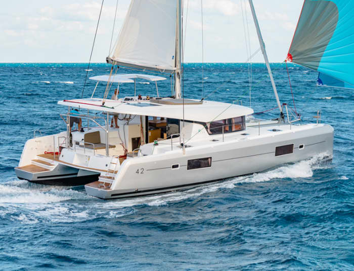 Catamaran Private Daytime Cruise with BBQ, Drinks & Transfers