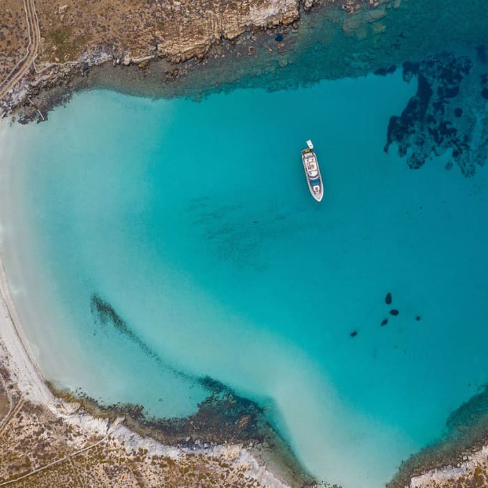 Rhenia, Delos & Mykonos Southern Coast | Private Full-Day Yacht Experience