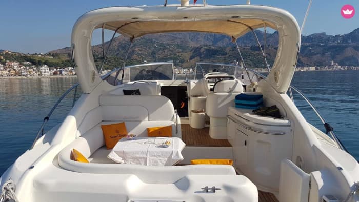 Sunset on a Boat on the Riviera: Golden Emotions between Sea and Caves