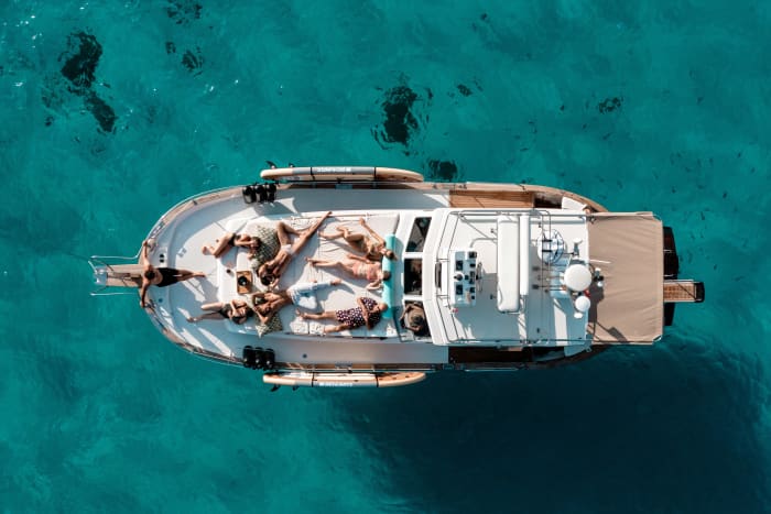Authentiek Ibiza vanaf het water: Privécruise van een hele dag vanuit San Antonio (8 uur)