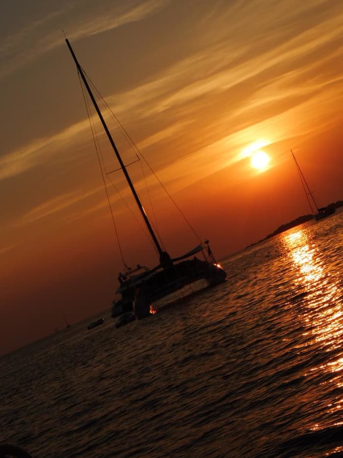 Cannigione Sunset Sail: Aperitif & Golden Views of the Maddalena Archipelago and Caprera