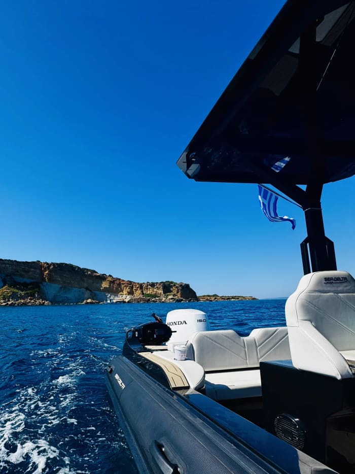 Romantic Sunset Boat Trip from Agios Sostis to Myzithres
