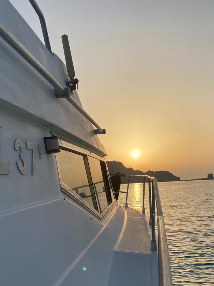 Coucher de soleil de rêve à Stintino : apéritif exclusif sur Isola Piana