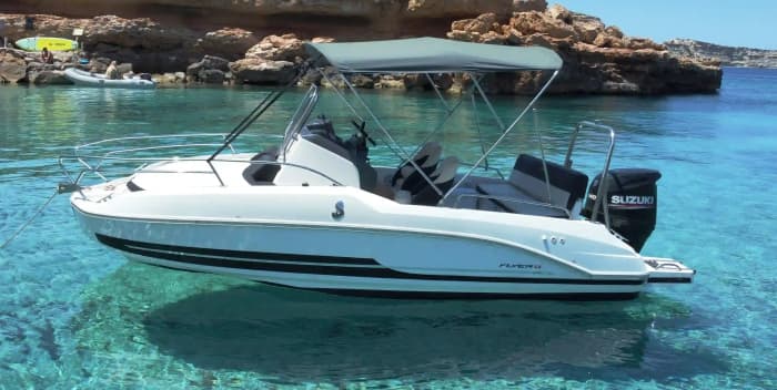 Full day on a private boat, caves, coves and turquoise waters