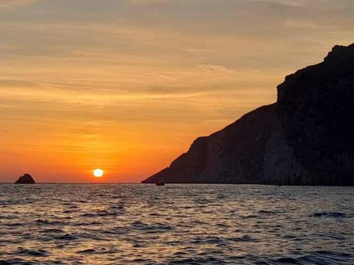 Sunset Journey Along Corfu’s Rugged Coastline